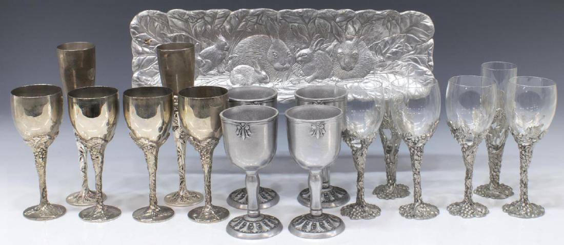 (17) PEWTER & SILVERPLATE TABLEWARE, WINE GLASSES: (lot of 17) Tableware, including: (4) Seagull Pewter wine glasses, pewter grapevine stem and foot, with glass bowl, 8"h, (2) Seagull Pewter champagne flutes, pewter grapevine stem and foot, with glass
