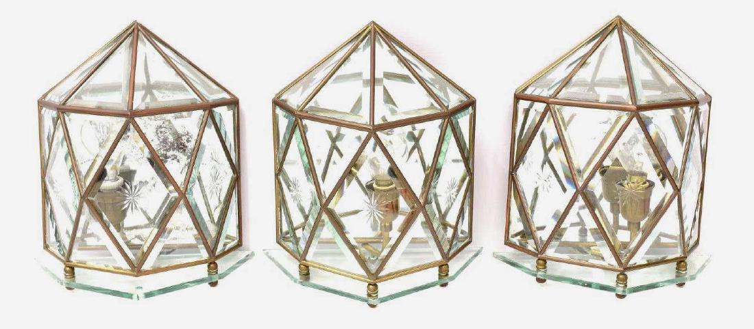 (3) ITALIAN SINGLE LIGHT BRASS & GLASS SCONCES: (lot of 3) Italian single light wall sconces, 20th c., each having brass frames supporting glass tops and faceted bodies over mirror bases, cut star accents, in need of wiring, one missing nut, each m