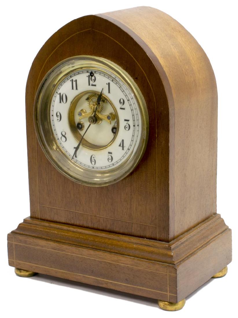 WATERBURY CLOCK CO. BEEHIVE CLOCK, OPEN ESCAPEMENT: Waterbury Clock Co. mantle clock, Waterbury, CT, early 20th c., white enameled porcelain dial, with black Arabic numerals and open escapement, marked time and strike movement, all set in mahogany beeh