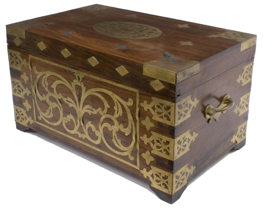 BRITISH COLONIAL BRASS BOUND HARDWOOD CHEST: British Colonial small hardwood trunk, 19th c., having brass bindings, side handles, and inlays, hinged lid, with fitted interior, with small compartments, central lift out tray revealing additional s