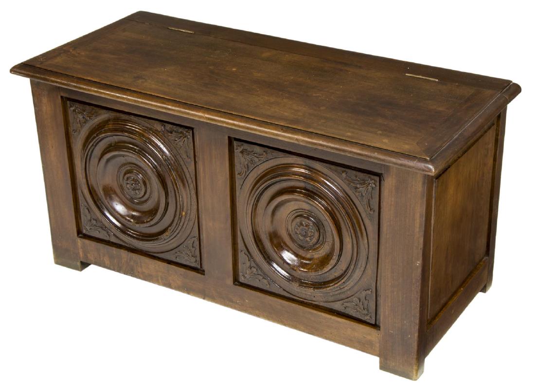 ITALIAN RENAISSANCE REVIVAL CASSONE STORAGE BENCH: Italian Renaissance revival cassone, early 20th c., hinged top, opening to storage, front panel with dual carved roundels centered by floral bloom, approx 18.75"h, 37.5"w, 16.5"d Start Price: $150.00