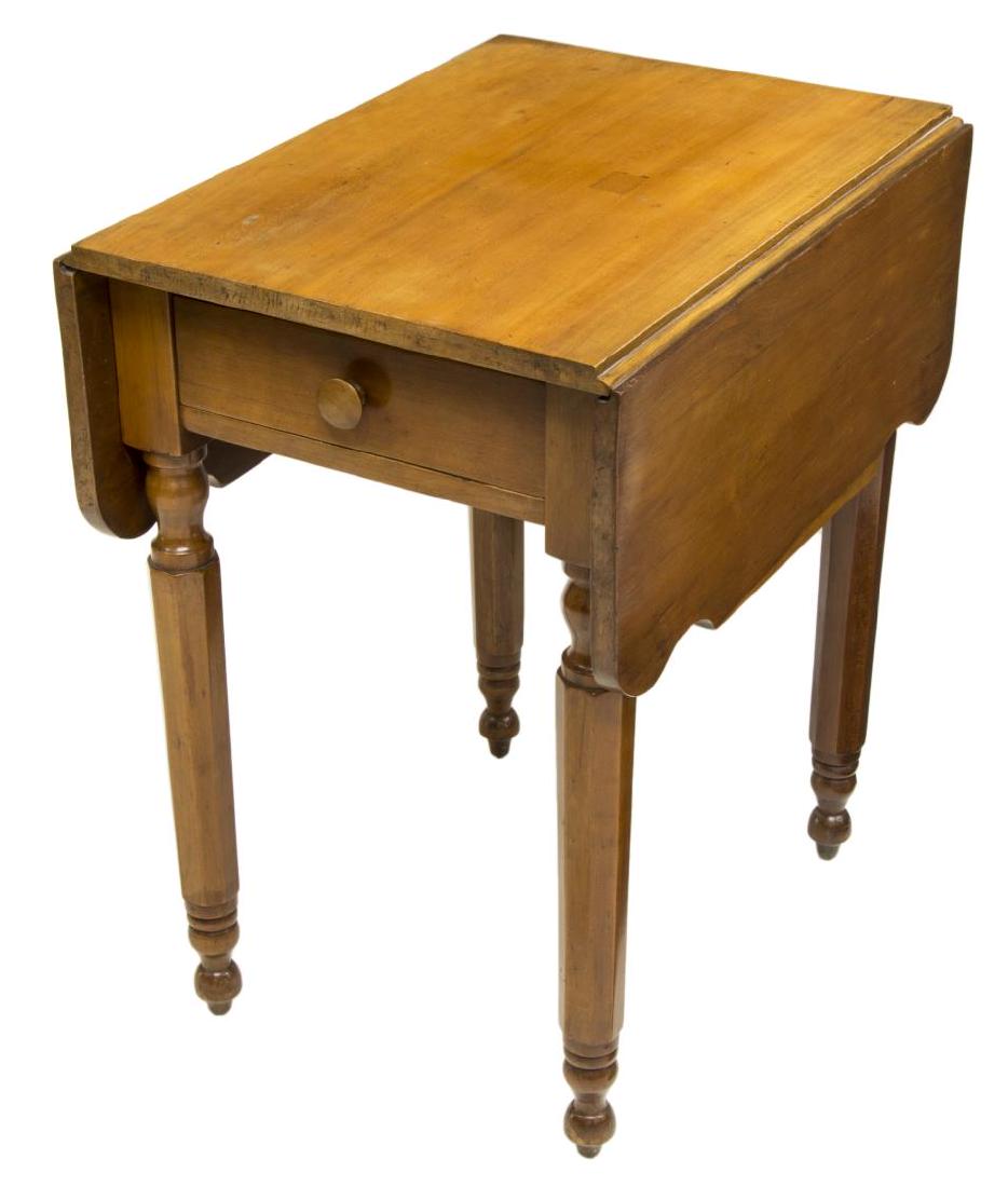 AMERICAN CHERRY DROP-LEAF TABLE: American cherry drop-leaf table, 19th c., rectangular tabletop, with shaped drop leaves, over apron fitted with one drawer, rising on turned legs, old repair to tabletop, closed: 28"h, 24"w, 18"d, bot