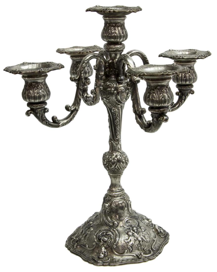 MARSHALL FIELD REPOUSSE STERLING CANDELABRA: Marshall Field & Company sterling silver repousse five-light candelabra, this piece is NOT weighted, each foliated branch ending in removable bobeche, join a rocaille standard completed by trailing fl