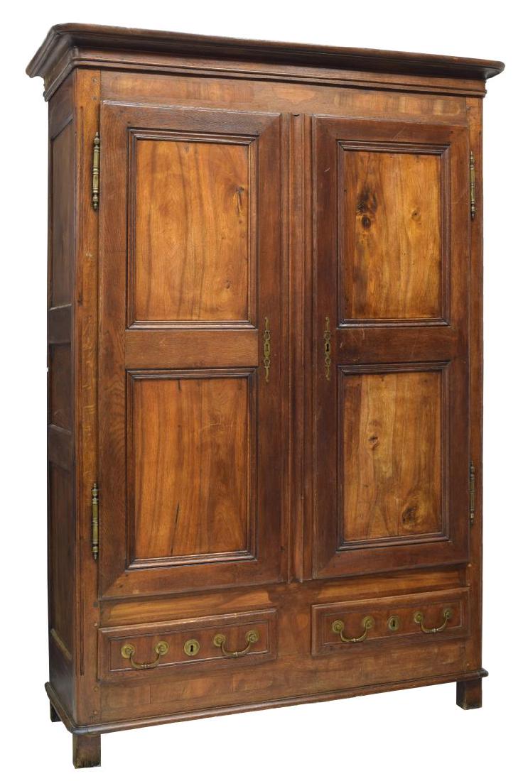 FRENCH PANELED OAK ARMOIRE W/ 2 DRAWERS, 19TH C.: French oak armoire, 19th c., a corniced top over two cabinet doors with shelves to interior, above two short drawers, rising on bracket feet, approx 84.25"h, 58.5"w, 21.5"d Start Price: $200.00