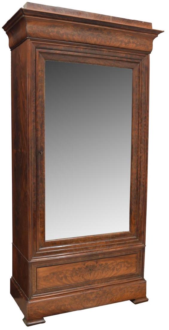 LOUIS PHILIPPE MAHOGANY ARMOIRE, MID 19TH C.: Louis Philippe mahogany armoire, mid 19th c., the cornice top over a single mirror-front cabinet door, the interior fitted with shelves and a single drawer, above a long drawer with a sliding cover to