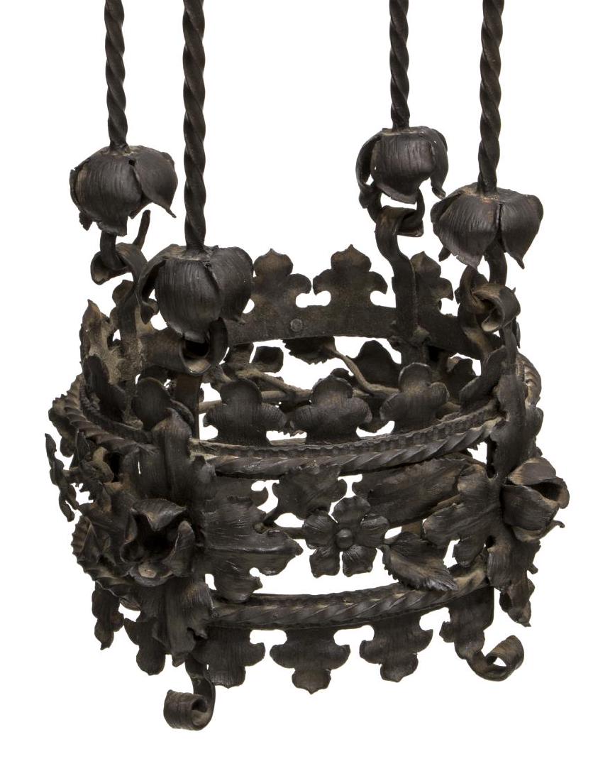 ITALIAN BLACK IRON SPIRALED FLORAL CHANDELIER: Italian black wrought iron chandelier, long spiraled arms, on the circular frame, accented with flowering buds and vines, in need of a hanging light socket and wiring, approx 67.5"l (from top of secon