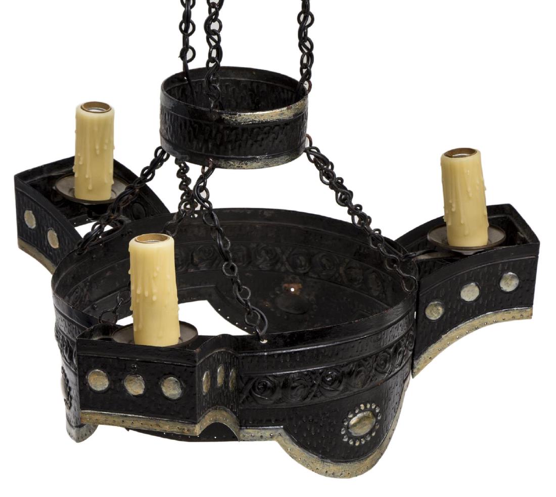 JUGENDSTIL ART NOUVEAU HAMMERED METAL CHANDELIER: Jugendstil three-light chandelier, Continental, c. 1900, having brass ceiling cap, hung with three chains, supporting hanging pendant with embossed rose design, three extending arms ending in faux can