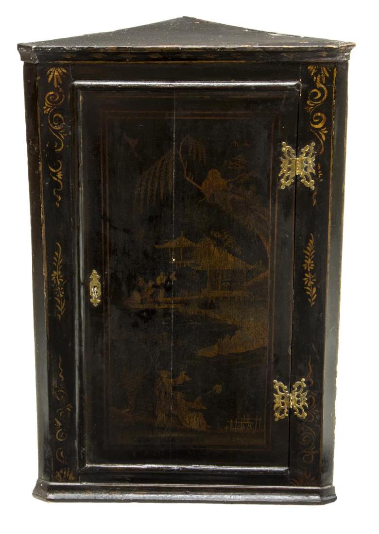 CHINOSERIE PAINTED WOOD PARCEL GILT CORNER CABINET: Chinoiserie black lacquer parcel gilt painted corner cabinet, 19th c., corniced top, over body with floral design, having cabinet door with pagoda landscape scene to front, shelves to interior, some w