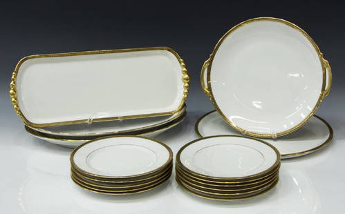 (16) FRENCH HAVILAND LIMOGES PARCEL GILT TABLEWARE: (lot of 16) French Limoges parcel gilt tableware, including: (14) Robert Haviland & Le Tanneur, with gilt laurel band, comprising (eleven) salad plates, 7.5"diam, (one) charger, 12"diam, (one) handled