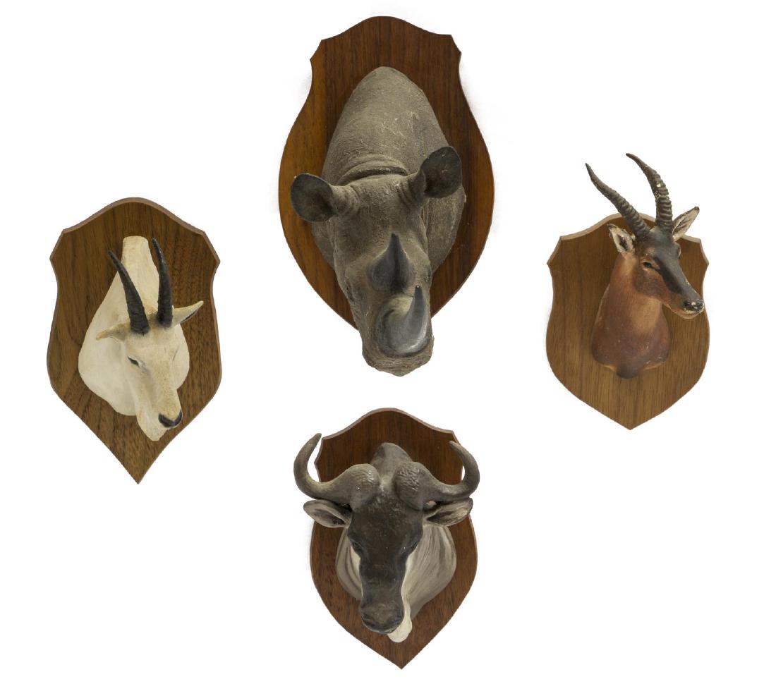 (4) LOUIS PAUL JONAS STUDIOS TROPHY MOUNTS, RHINO: (lot of 4) Louis Paul Jonas (American, 1894-1971) Studios miniature trophy mounts, signed to back, including: (1) Black Rhinoceros, numbered 8/89 to back; (1) White-bearded Gnu; (1) Topi, numbered 8/8