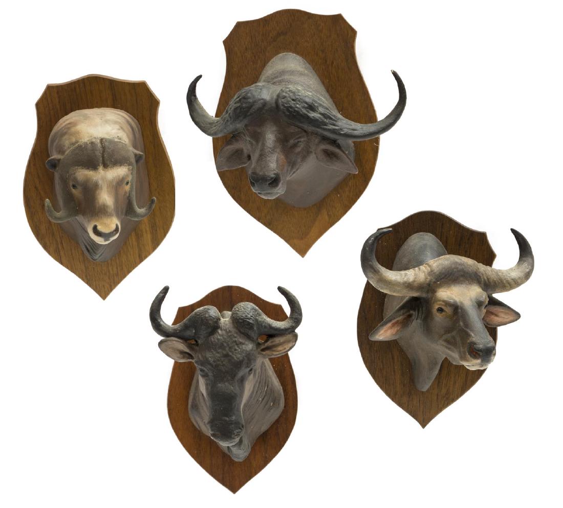 (4) LOUIS PAUL JONAS STUDIOS TROPHY MOUNTS, MUSKOX: (lot of 4) Louis Paul Jonas (American, 1894-1971) Studios miniature trophy mounts, signed to back, including: (1) Cape Buffalo; (1) Gaur Ox, numbered 7/97 to back; (1) Brindled Gnu; (1) Muskox, number