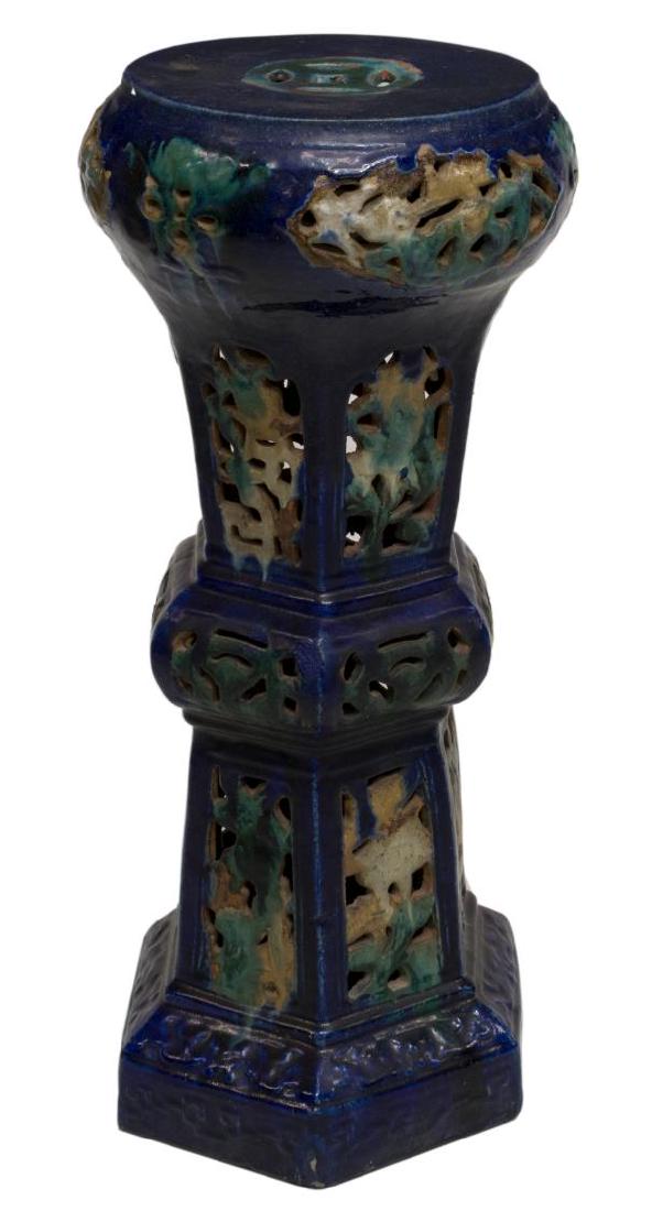 CHINESE PIERCED CERAMIC PEDESTAL PLANT STAND: Chinese pierced ceramic plant stand, flat circular top over hexagonal body and base, in blue, green and yellow glaze, approx 31"h, 14"diam, 31.25lbs Start Price: $250.00