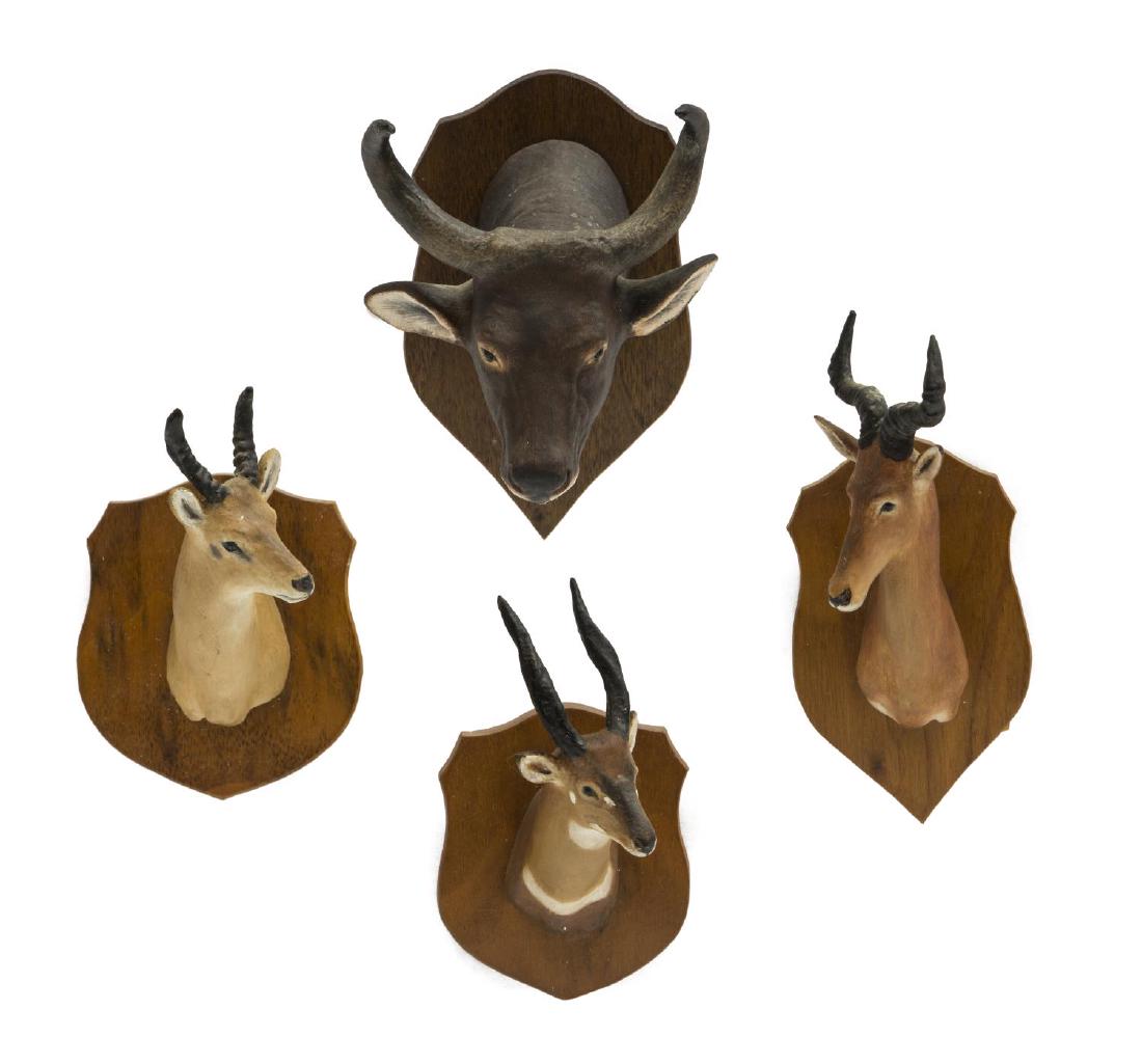 (4)LOUIS PAUL JONAS STUDIOS TROPHY MOUNTS, BANTENG: (lot of 4) Louis Paul Jonas (American, 1894-1971) Studios miniature trophy mounts, signed to back, including: (1) Banteng, numbered 7/97 to back; (1) Jackson's Hartebeeste, numbered 8/89 to back; (1)