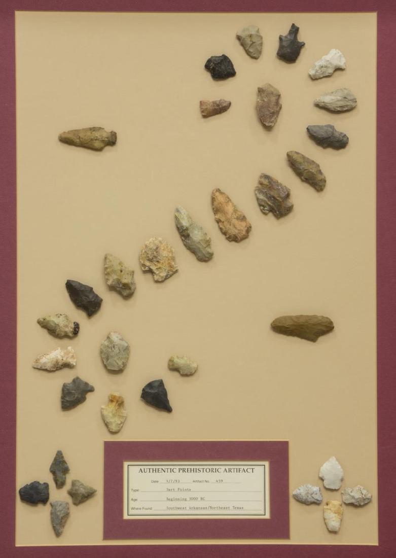 (32) FRAMED ARROWHEADS, DART POINTS: Shadow box framed arrowheads tagged "Authentic Prehistoric Artifact", dated 9/7/93, "Dart Points", "Southwest Arkansas/Northeast Texas", 32 examples with largest approximately 2.25"l, frame: 26.75"h, 