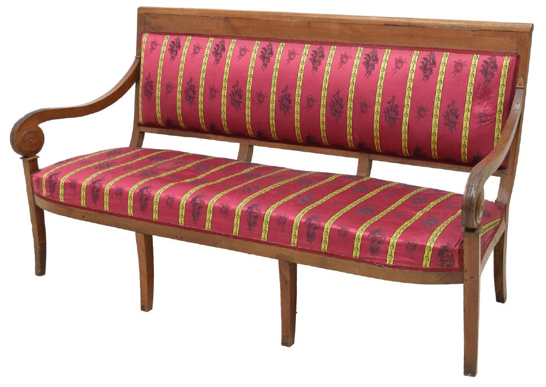 LOUIS PHILIPPE WALNUT UPHOLSTERED SOFA, 19TH C.: Louis Philippe walnut sofa, c. 1850's, with red and yellow striped upholstery, the straight back over scrolled arms and rising on outswept legs, old repair to arm, approx 38"h, 69"w, 26"d Start Price: