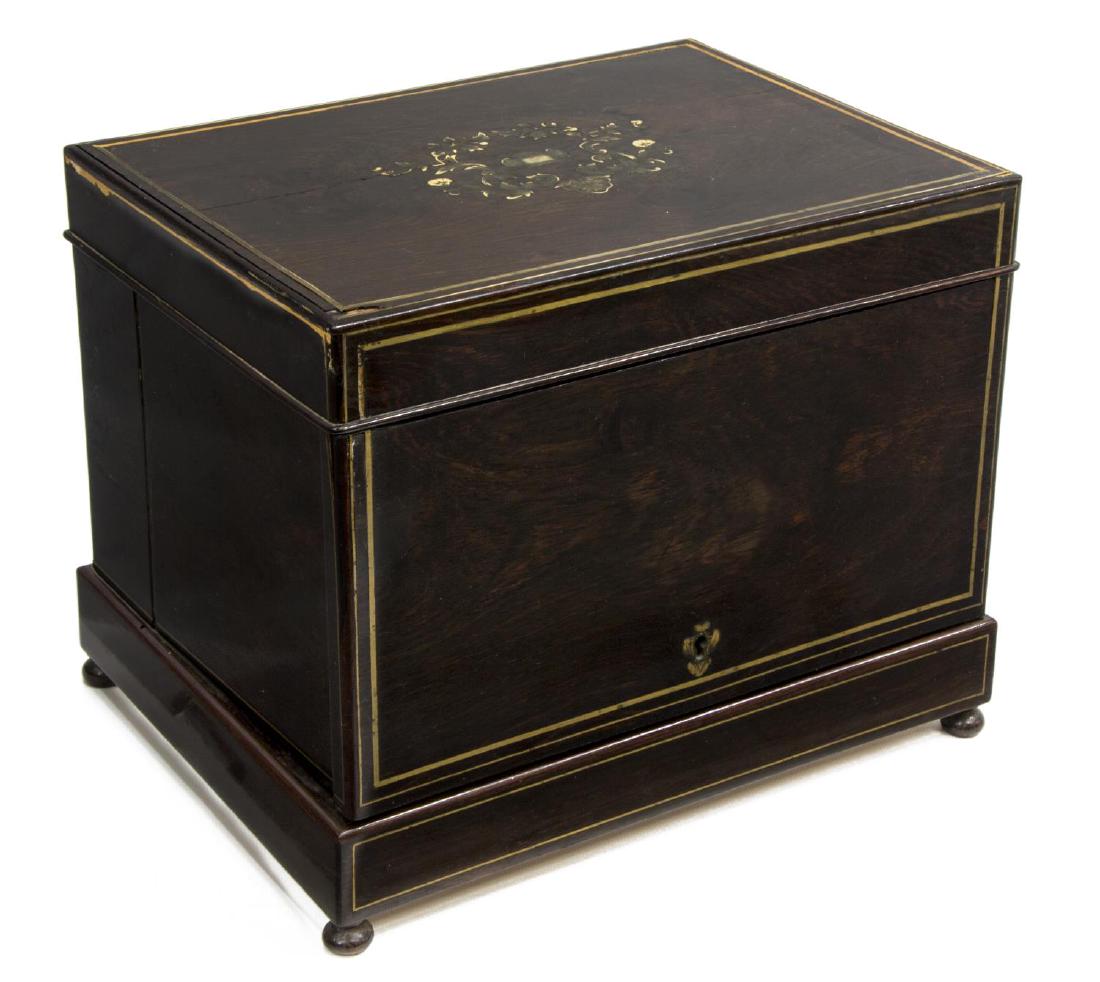 FRENCH BRASS & BONE MARQUETRY TANTALUS SET: French marquetry and string inlaid tantalus set, 19thc., the top with brass and bone inlays, opening to a sectioned interior fitted with (4) decanters and (11) cordial glasses (most with rim chips), t