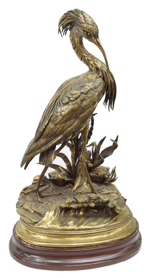JULES MOIGNIEZ (1835-1894) WILDLIFE BRONZE HERON: Monumental bronze wildlife figure, 19th c., Heron, signed in cast J. Moigniez (Jules Moigniez, France, 1835-1894), the standing bird on a naturalistic base with crashing wave and shells, presented on 