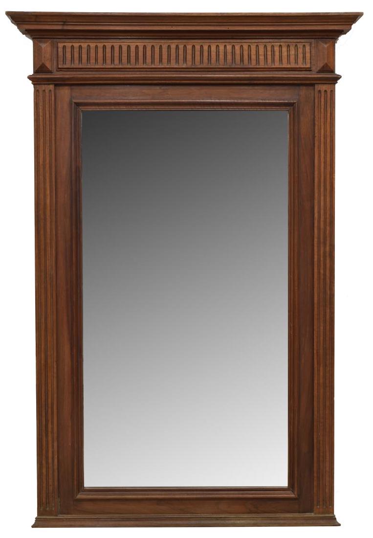 FRENCH HENRI II STYLE CARVED MAHOGANY WALL MIRROR: French Henri II style carved mahogany finish wall mirror, 19th c., the corniced top over a scoop molded frieze, holding a beveled plate mirror, approx 63"h, 42.75"w, 4.5"d, 65lbs Start Price: $100.00