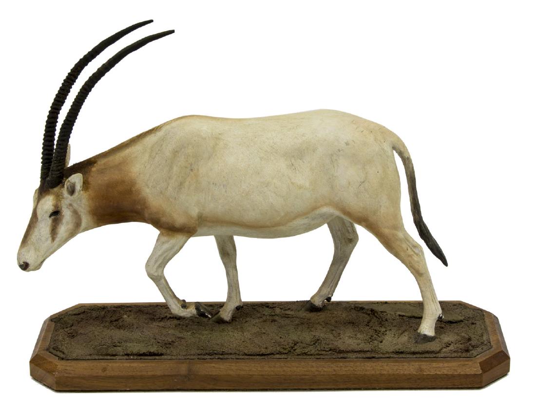 LOUIS PAUL JONAS STUDIOS SCIMITAR-HORNED ORYX: Louis Paul Jonas (American, 1894-1971) Studios wildlife sculpture, Scimitar-horned Oryx, signed and numbered 1093 to back right, crazing to paint, approx 7.75"h, 10.5"w, 3.25"d, 1.25lbs**Provenance: F