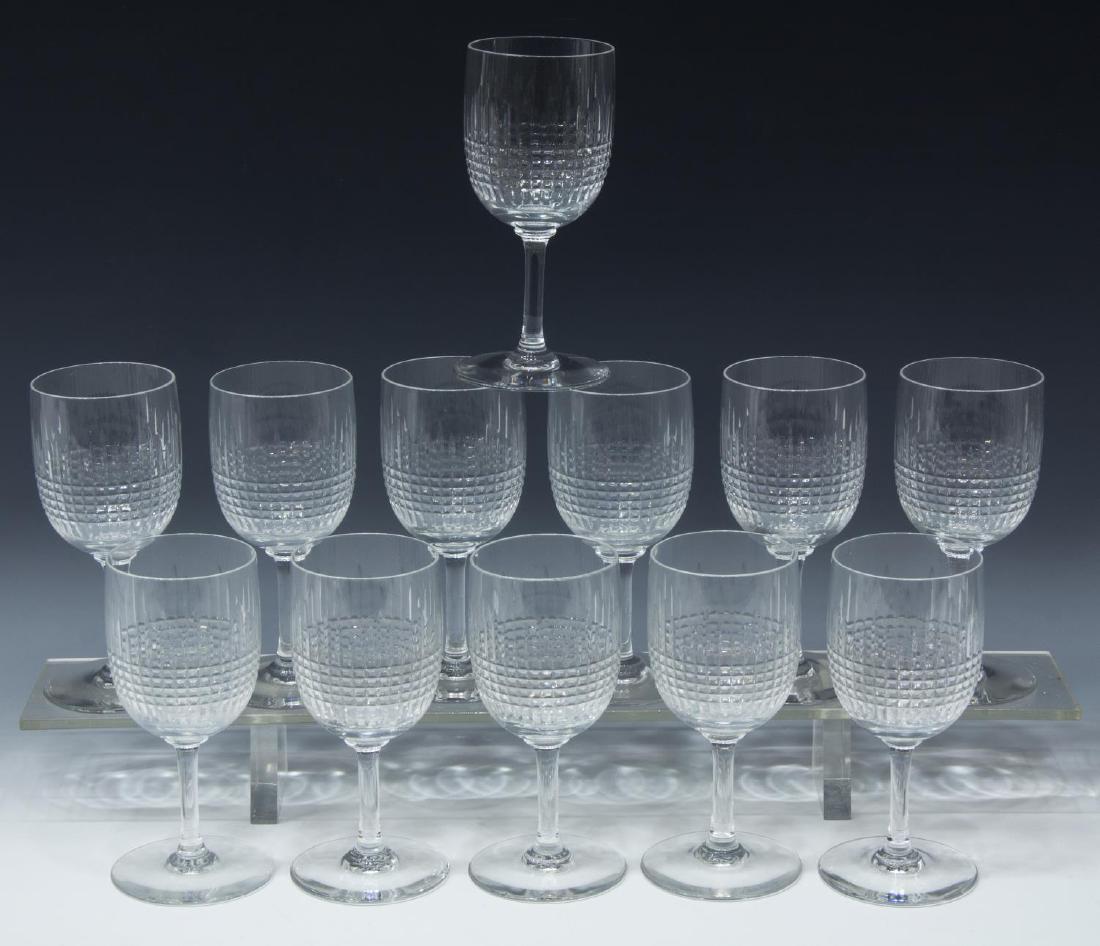 (12) BACCARAT 'NANCY' CUT CRYSTAL CLARET GLASSES: (set of 12) Baccarat "Nancy" cut crystal claret wine glasses, acid etched mark underfoot, approx 5.5"h, 2.75"diam, 4lbs total Start Price: $150.00
