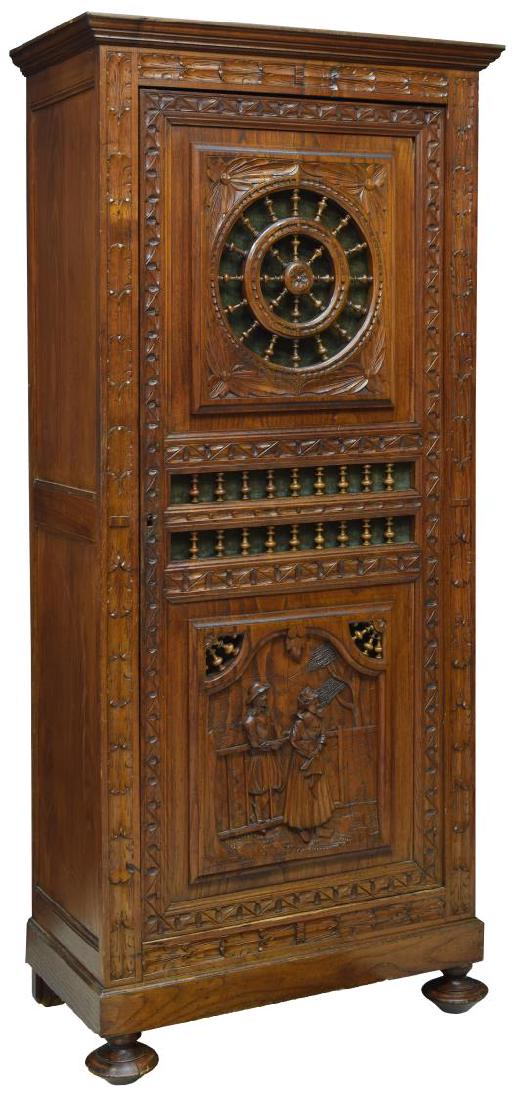 BRETON FIGURAL CARVED OAK BONNETIERE, LATE 19TH C. (1 of 2)