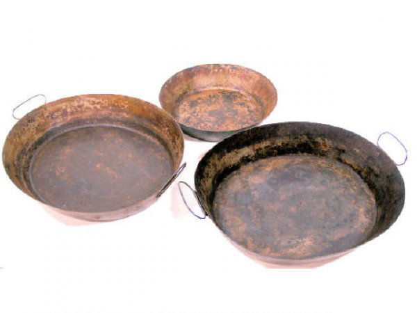 THREE AMISH ANTIQUE BAKING PANS HAND FORGED: A group of three graduated size Amish baking pans hand forged and purchased in Pennsylvania. The larger two pans have hand riveted handles. Two were priced at $200 each. One is about 3.5"x16"x13", one