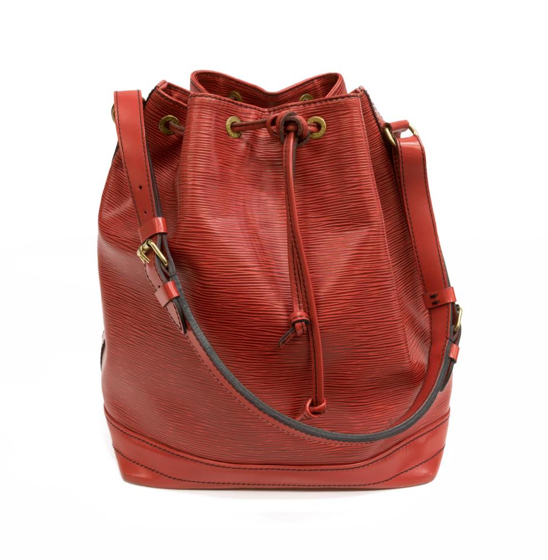LOUIS VUITTON 'NOE' RED EPI LEATHER BUCKET BAG: Louis Vuitton "Noe" bucket bag, in red Epi leather, with brass hardware, single flat adjustable shoulder strap, black Alcantara lining with key tab, drawstring closure at front face, scuffing, and wea
