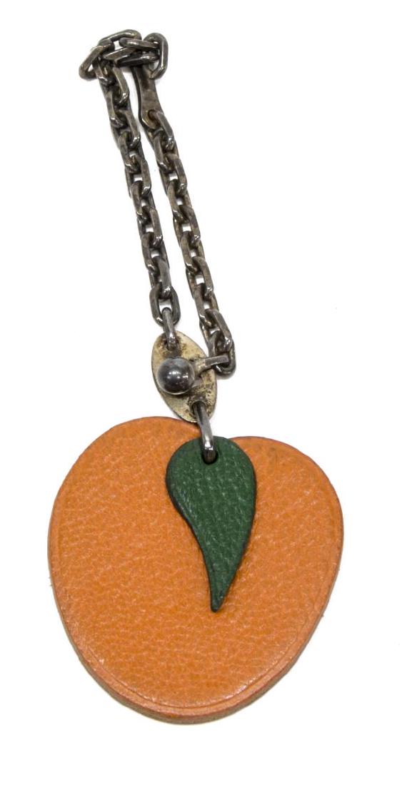 HERMES PEACH LEATHER KEYCHAIN BAG CHARM (1 of 3)