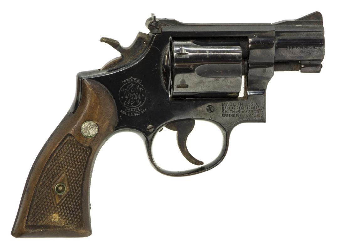 SMITH & WESSON MODEL 15-2 REVOLVER .38 SPL: Smith & Wesson Model 15-2 double action revolver, .38 S&W Special caliber, six round swing out cylinder, 2" barrel, adjustable rear sight, checker wood Smith & Wesson grips, SN K538XXX *REQUIRES FFL T
