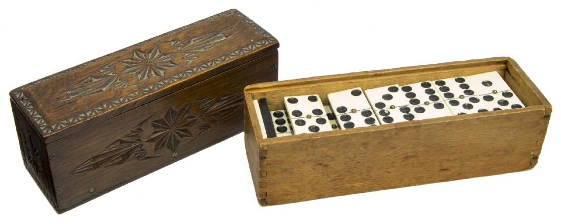 (2 SETS) ANTIQUE 19TH C. BONE & EBONY DOMINOS: (lot of 2) Antique dominos: (1) highly polished bone and ebony set, each tile with center spinner, housed in dovetailed wood box lacking lid, box: 2.25"h, 8.5"w, 2.75"d; (1) bone and ebony set in carv
