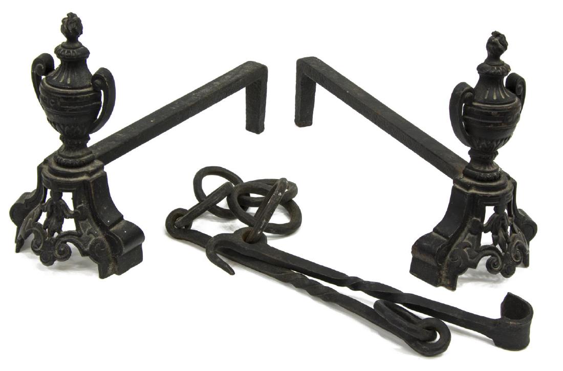(3) ITALIAN IRON FLAMING URN ANDIRONS & POT HOOK: (lot of 3) Italian iron fireplace fittings, 19th c., including: (pair) flaming urn andirons, approx 9.75"h, 5.5"w, 15.25"d, (1) wrought iron chain pot/ kettle hook, approx 35.25"l; 10lbs total Start P