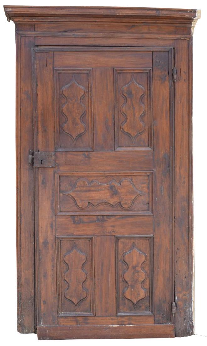 ITALIAN ARCHITECTURAL MONASTERY WALNUT DOOR: Italian architectural monastery walnut door, 18th c., having frame with cornice top, fitted with paneled door, wear, losses to frame, approx 85.75"h, 48"w, 6"d Start Price: $600.00
