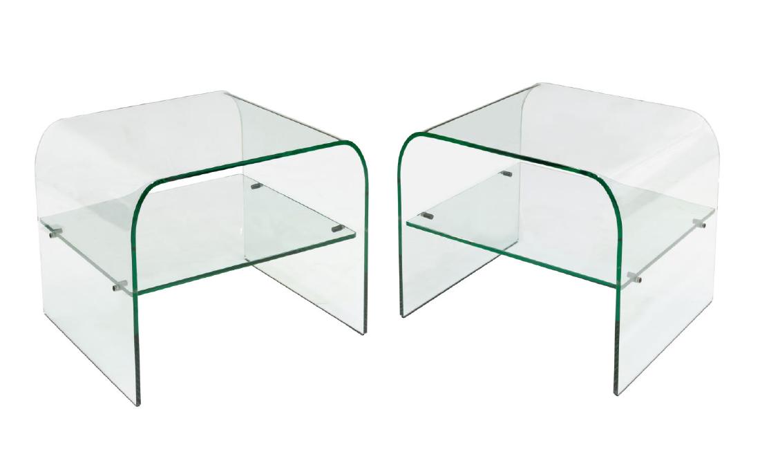 2) AFTER PIEOTRO CHIESA ALL-GLASS SIDE TABLES: (pair) Italian modern glass cocktail / side tables, c. 1970's, design after Pietro Chiesa (1892 – 1948), curved glass form with medial glass shelf, approx 17.25"h, 20.25"w, 17.75"d Start Price: $150