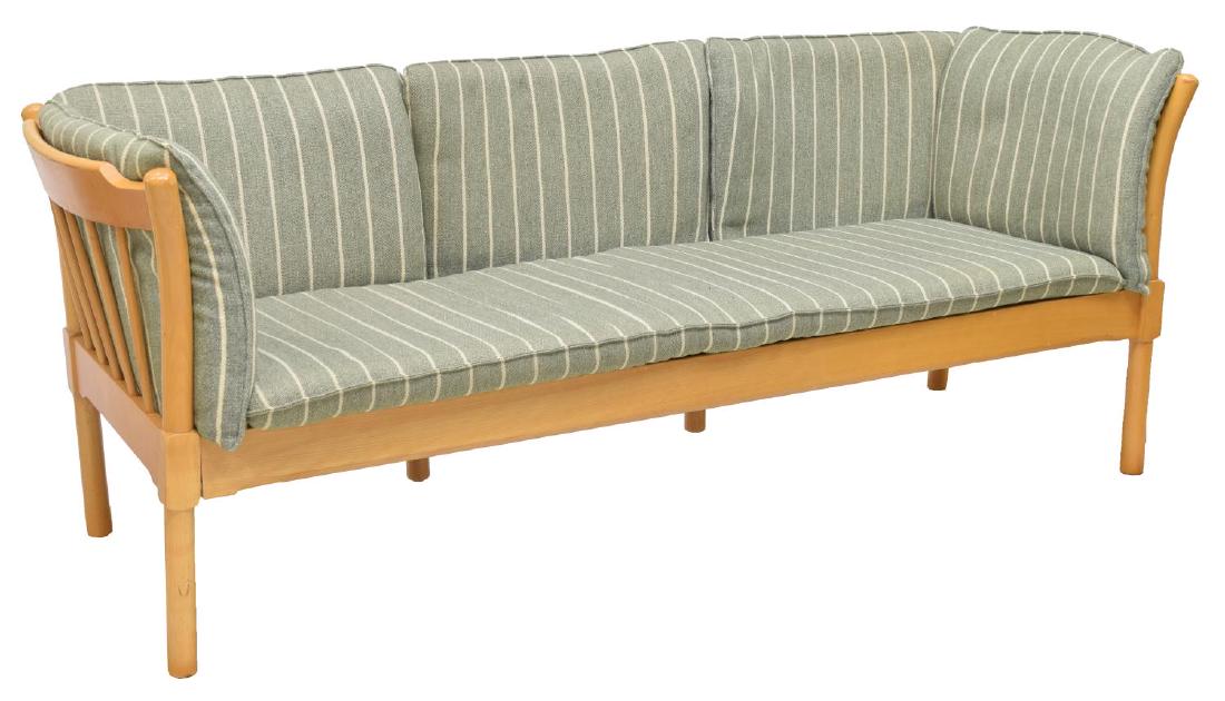 DANISH MODERN THREE SEAT BEECH SOFA: Danish modern three seat sofa, mid to late 20th c., having removable back, seat, and side cushions on beech frame, approx 32"h, 77"w, 28"d Start Price: $200.00