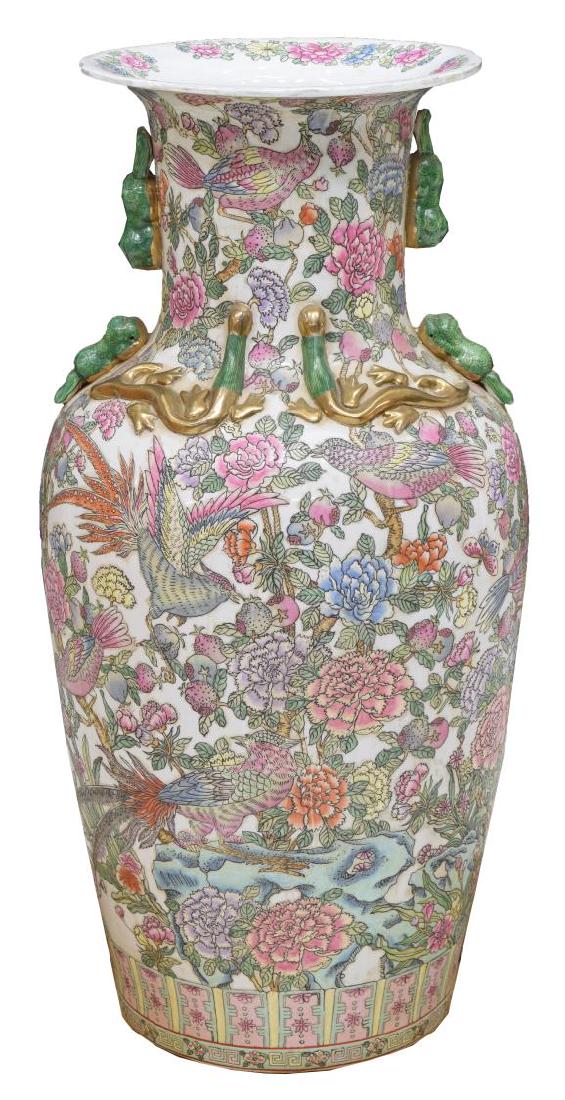 LARGE CHINESE FAMILLE ROSE PARCEL GILT FLOOR VASE: Large Chinese famille rose porcelain parcel gilt vase, the flared rim over a long neck accented with applied foo dogs and gilt salamanders, tapered body with floral and bird design, rising on circular