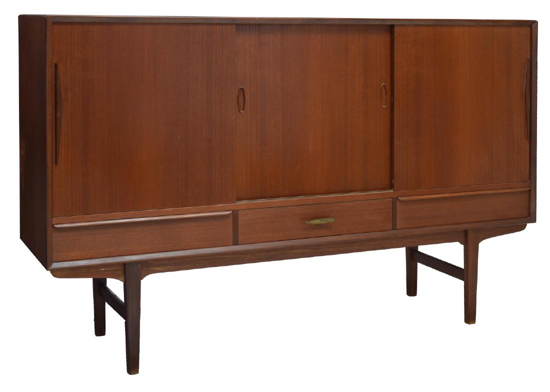 DANISH MID-CENTURY MODERN TEAKWOOD SIDEBOARD: Danish mid-century modern teak sideboard, c. 1950s, sliding doors open to shelving and tray drawers, over three drawers, on stretcher joined base, some discoloration, veneer loss/repair to sides, appr
