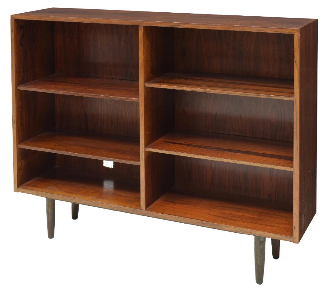 DANISH OMANN JUN MID-CENTURY ROSEWOOD BOOKCASE: Danish mid-century modern rosewood bookcase, c. 1960s, produced by Omann Jun Mobelfabrik, having rectangular case, fitted with adjustable shelves, rising on tapered legs, Omann Jun label to back, appr
