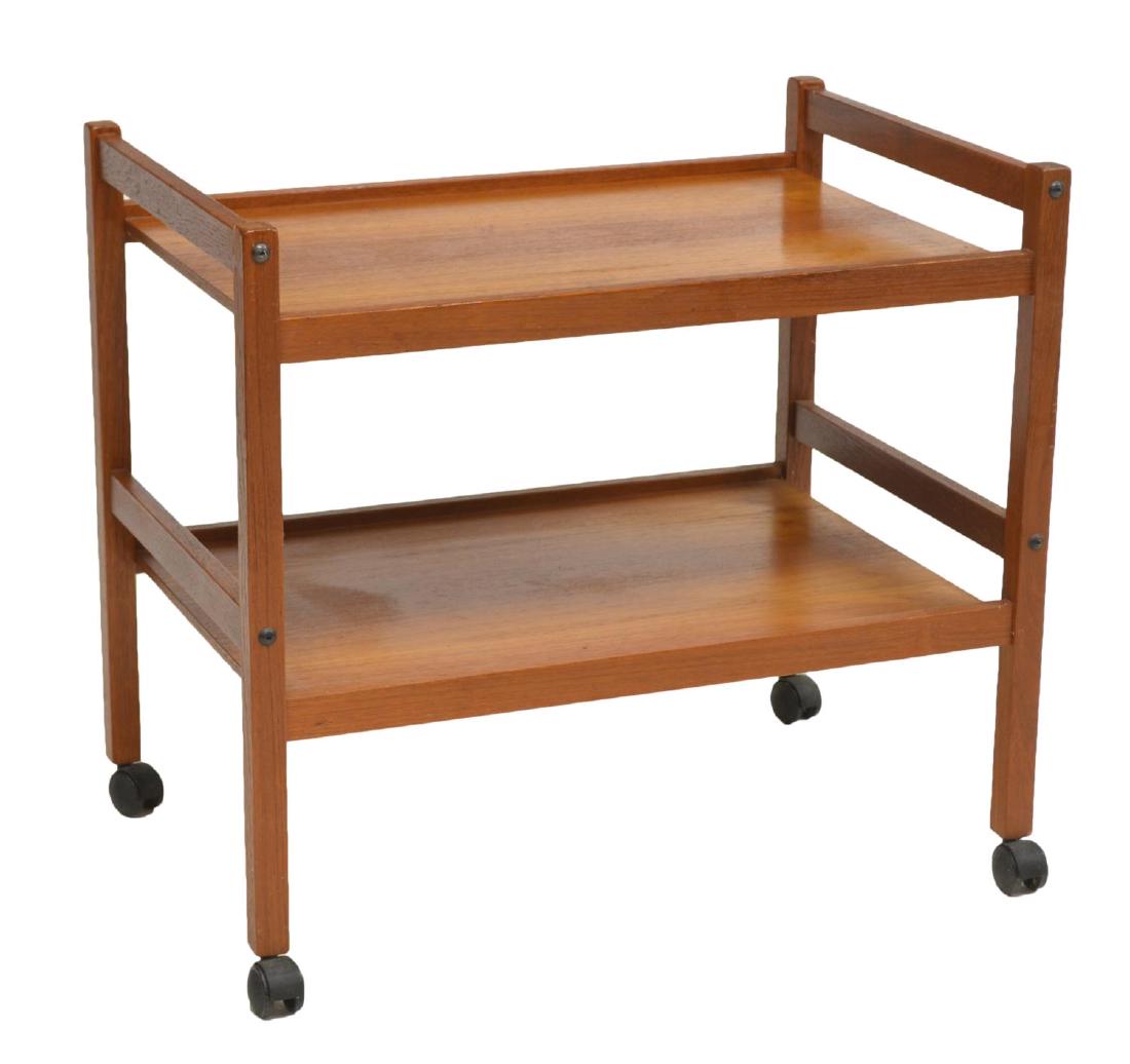 DANISH MID-CENTURY MODERN TEAK TRAY BAR CART: Danish mid-century modern teak bar cart, c. 1950s, having two tiers, joined by straight supports, on wheels, approx 25"h, 27.5"w, 18.5"d Start Price: $100.00