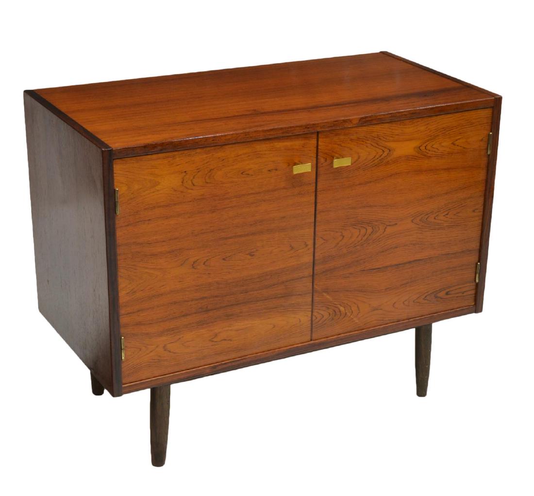 DANISH MID-CENTURY MODERN ROSEWOOD CABINET: Danish mid-century modern rosewood cabinet, c. 1960s, having rectangular case, fitted with double-door cabinet, opening to shelf, rising on tapered legs, approx 27"h, 33.5"w, 17"d Start Price: $150.00
