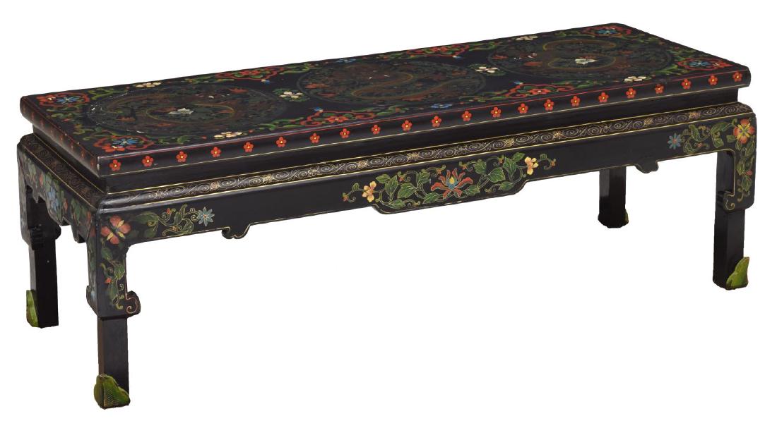 BLACK LACQUER PAINTED DRAGON SOFA TABLE, CHINESE: Chinese black lacquer sofa table with polychrome painted floral designs, the rectangular top having three round dragon reserves, rising on shaped legs, approx 17.5"h, 51.5"w, 19.25"d Start Price: $50.