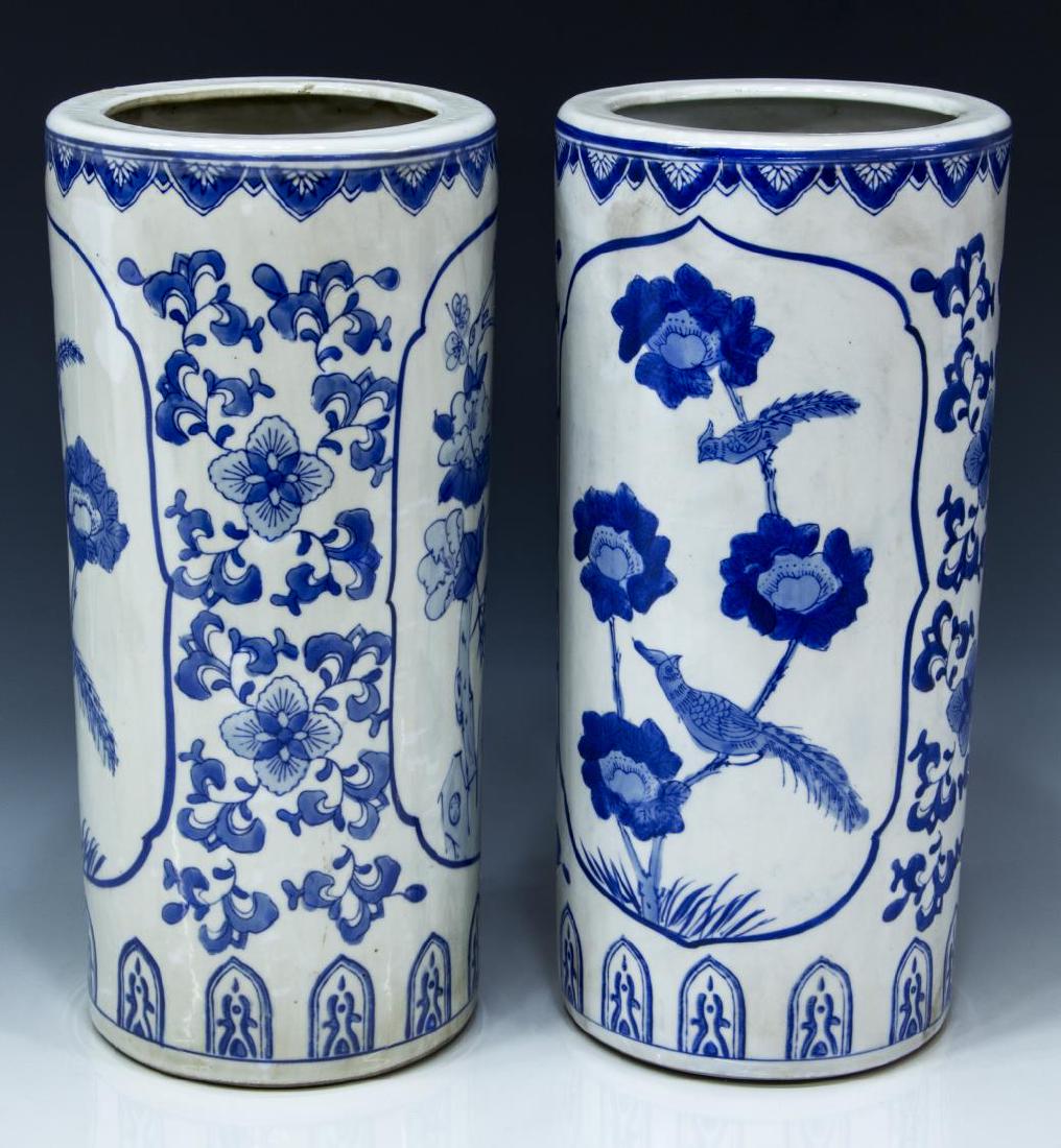 (2) CHINESE BLUE AND WHITE PORCELAIN HAT STANDS: (pair) Chinese blue and white porcelain hat stand, each having a cylindrical body decorated with foliate designs and centered by bird and floral reserves, approx 15"h, 7"diam; 12.5lbs total Start Pric