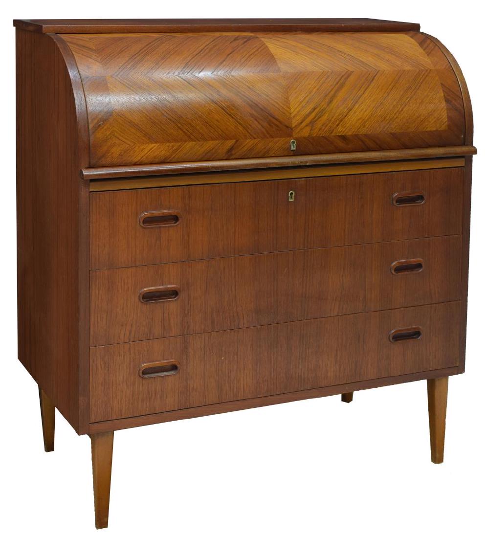 DANISH MID-CENTURY MODERN TEAK BUREAU DESK: Danish mid-century modern teak desk, c. 1950s, having roll top, opening to fitted interior gallery and pull-out writing surface, over lower case fitted with three drawers with recessed pulls, rising o