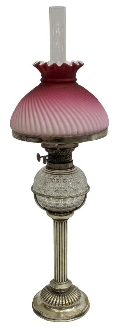 ENGLISH SILVERPLATE & CUT GLASS STANDING OIL LAMP: Hukin & Heath silverplate standing oil lamp, Birmingham, fitted with a cane-cut glass font, wick burners marked Martins Patent, colorless hurricane shade with loss at base, a swirled pink to white cas