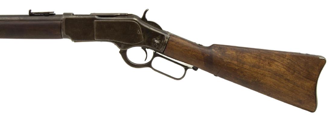 1873 WINCHESTER SADDLE RING CARBINE, ANTIQUE: Winchester Model 1873 saddle ring carbine, Third Model, mfg. 1882, 44.40 caliber, 20" round barrel with two bands, marked at the top "Winchester's-Repeating-Arms-New Haven Ct.-King's-Improvement-Paten