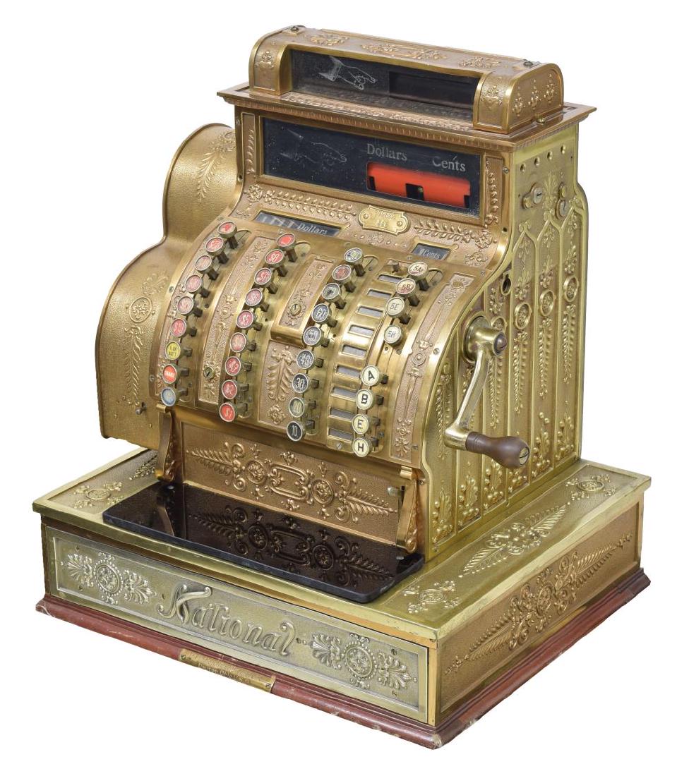 NATIONAL CASH REGISTER MODEL 441, RED BRASS: National cash register, Model 441, SN 772822, red brass in the Empire pattern, receipt cage at left, crank handle at right, 21"h, 19"w, 15"d Start Price: $200.00