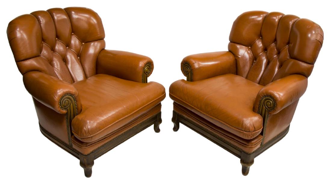 (2) ENGLISH BROWN LEATHER CLUB CHAIRS: (lot of 2) English mahogany club chairs, late 20th c., upholstered in brown leather with buttoned pleated back above a removable seat cushion, rising on short cabriole legs, 35"h, 35"w, 36"d Start Pri