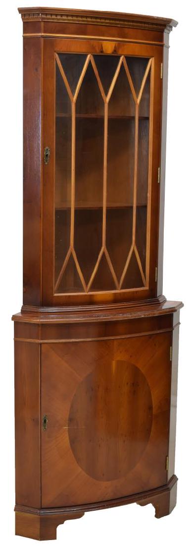 ENGLISH MAHOGANY CORNER CABINET: English mahogany corner cabinet, 20th c., an astragal faced curved glass door opening to shelves above the lower string inlay door, all rising on bracket feet, 71.5"h, 26"w, 19"d Start Price: $100.00