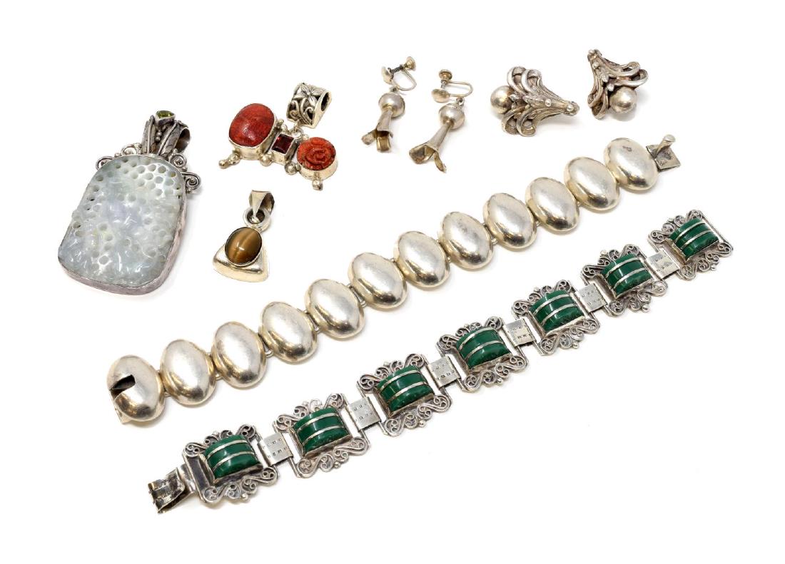(LOT) COLLECTION OF STERLING SILVER JEWELRY, TAXCO: (lot) Collection of silver jewelry, including: (pair) sterling squash blossom screw-back earrings, (pair) silver-tone clip-on earrings, marked Sandor, (1) Taxco sterling bracelet, with oval links, hal
