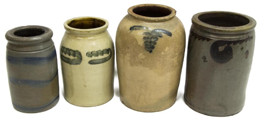 (4) AMERICAN SALT GLAZED STONEWARE CROCKS JARS: (lot of 4) American salt glazed stoneware crocks/ canning jars, late 19th/ early 20th c., with cobalt blue and Albany slip decoration, one with illegible impressed stamp, largest: approx 10.75"h, 7.5"