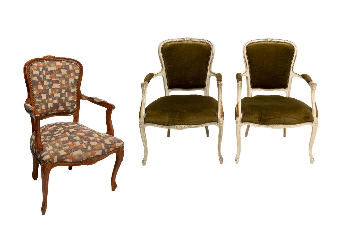 (3) FRENCH LOUIS XV STYLE FAUTEUIL ARMCHAIRS: (lot of 3) French Louis XV style fauteuil armchairs, similarly styled, (two) having white painted frames, with green velvet upholstered back, armrests, and seat, rising on cabriole legs, ending in who